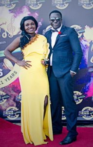 Dennis Wambi (right) and a colleague, Tricia Wabito, during the 11th edition of Groove Awards Kenya.