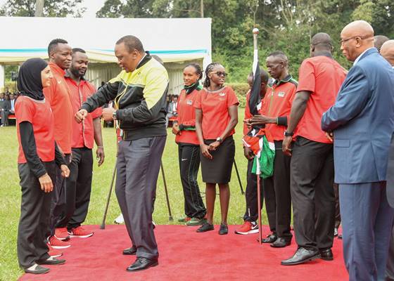 THIS WAY AND THAT WAY: President Uhuru appears to be offering some tips to the lady.