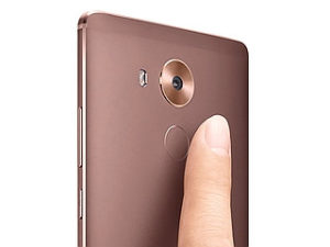 The fingerprint sensor is located at the back top.