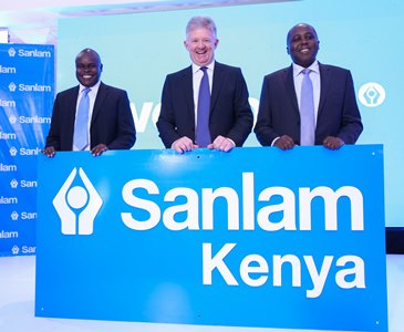 Sanlam Emerging Markets Regional Executive for East Africa Julius Magabe flanked by Sanlam Group CEO Ian Kirk and Sanlam Kenya Group CEO Mr Mugo Kibati unveil the Sanlam Kenya brand identity during a media briefing at the Stanley Hotel in Nairobi. 