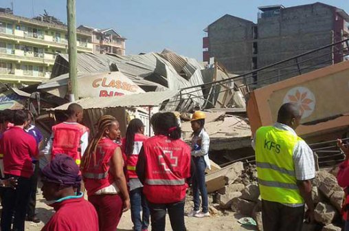 Red Cross staff lead rescue efforts at the scene.