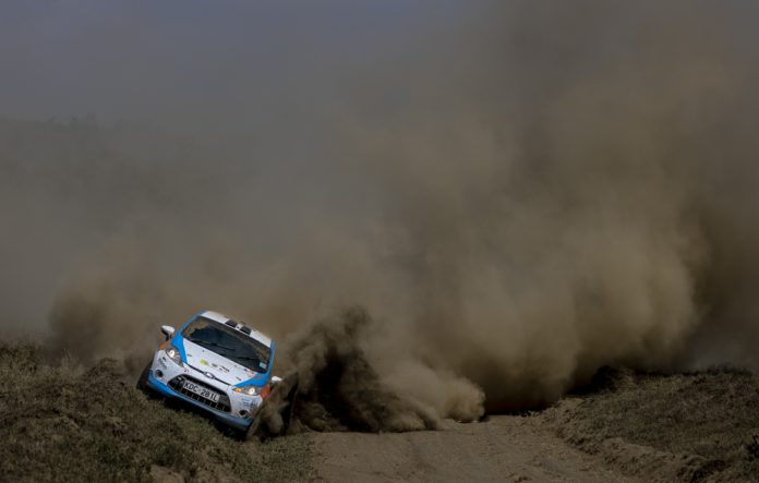 Mwarv Rio Smith and Laban Cliff Onserio pictured driving on the edge of the road to avoid ruts during the WRC Safari Rally 2021. Smith was the youngest entrant in the rally.